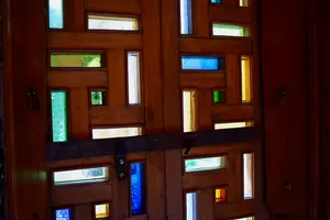 Various rectangles with stained glass in a wooden door